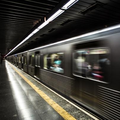 Blur image of a train in a subway