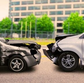 Image of two cars in collision on the road