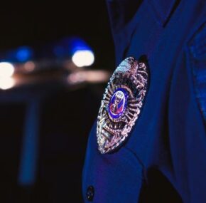 Badge of night shift police officer