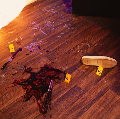 Homicide crime scene with evidences on the floor