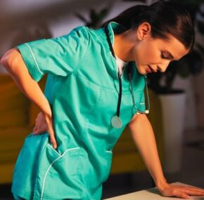 Female nurse having back pain