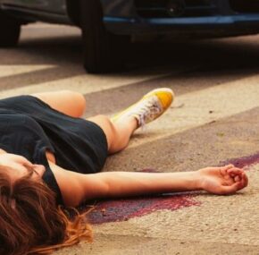 Woman pedestrian hit by a car