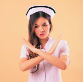 angry nurse saying no, crossing arms