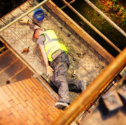 A male worker fell off the scaffolding in the construction site