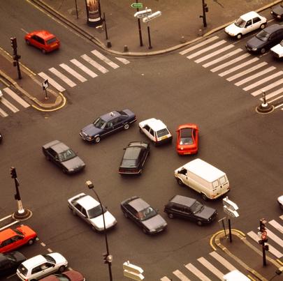 Cars in an intersection traffic. Who has the right of way?