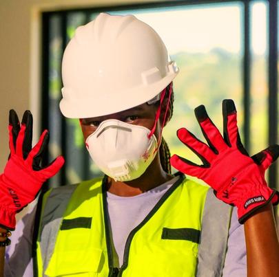 Female worker wearing proper PPE