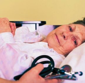 Bedridden elderly woman with sepsis in nursing home