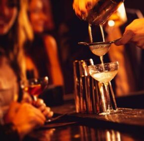 Barman Serving Cocktail Drinks