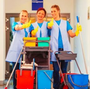 Cleaning service at work. Three women in teamwork