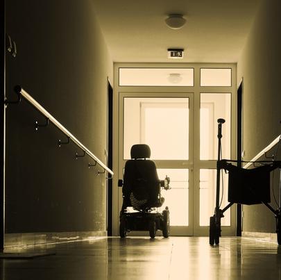 Lonely corridor with walkers in nursing home