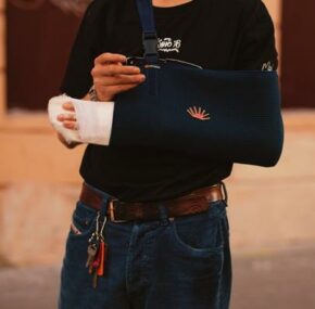 Injured arm of man from negligence or recklessness?